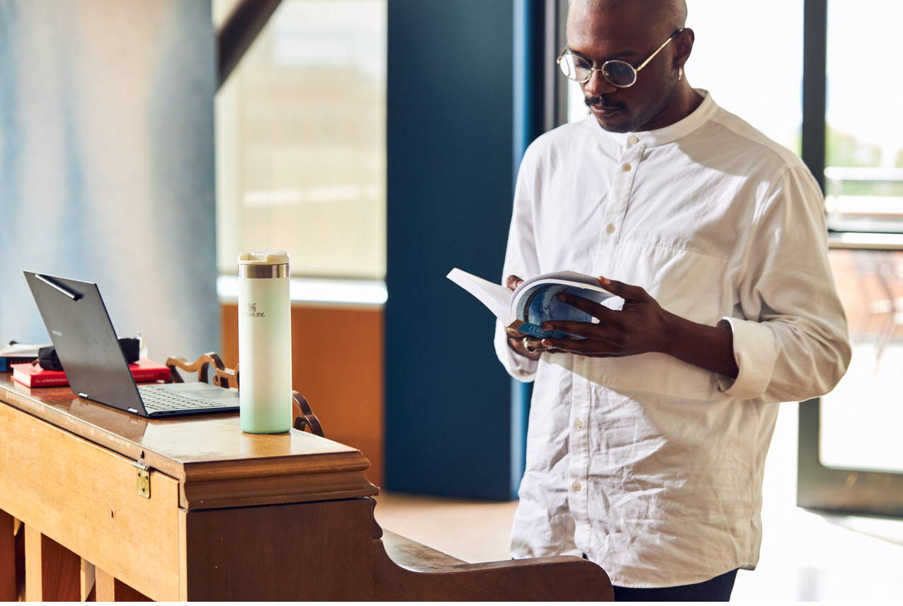 Employee Reading A Manual