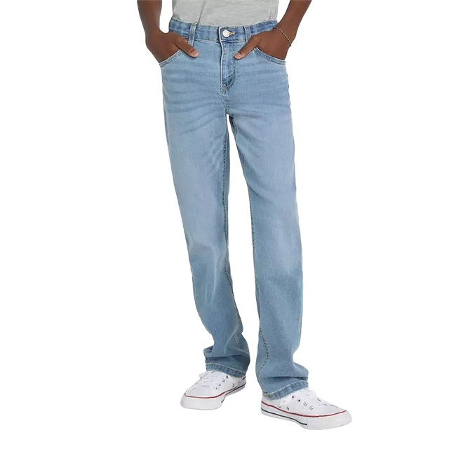Person wearing light blue jeans and white shoes, hands in pockets.
