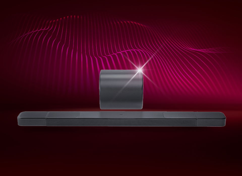 A sleek black soundbar and subwoofer against a gradient background.