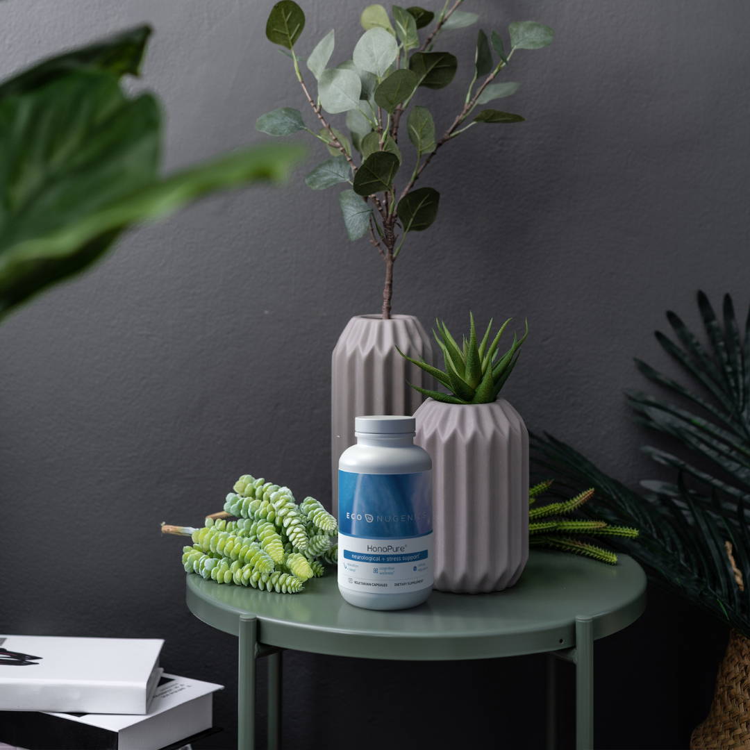 pure honokiol supplement on bedside table with plants