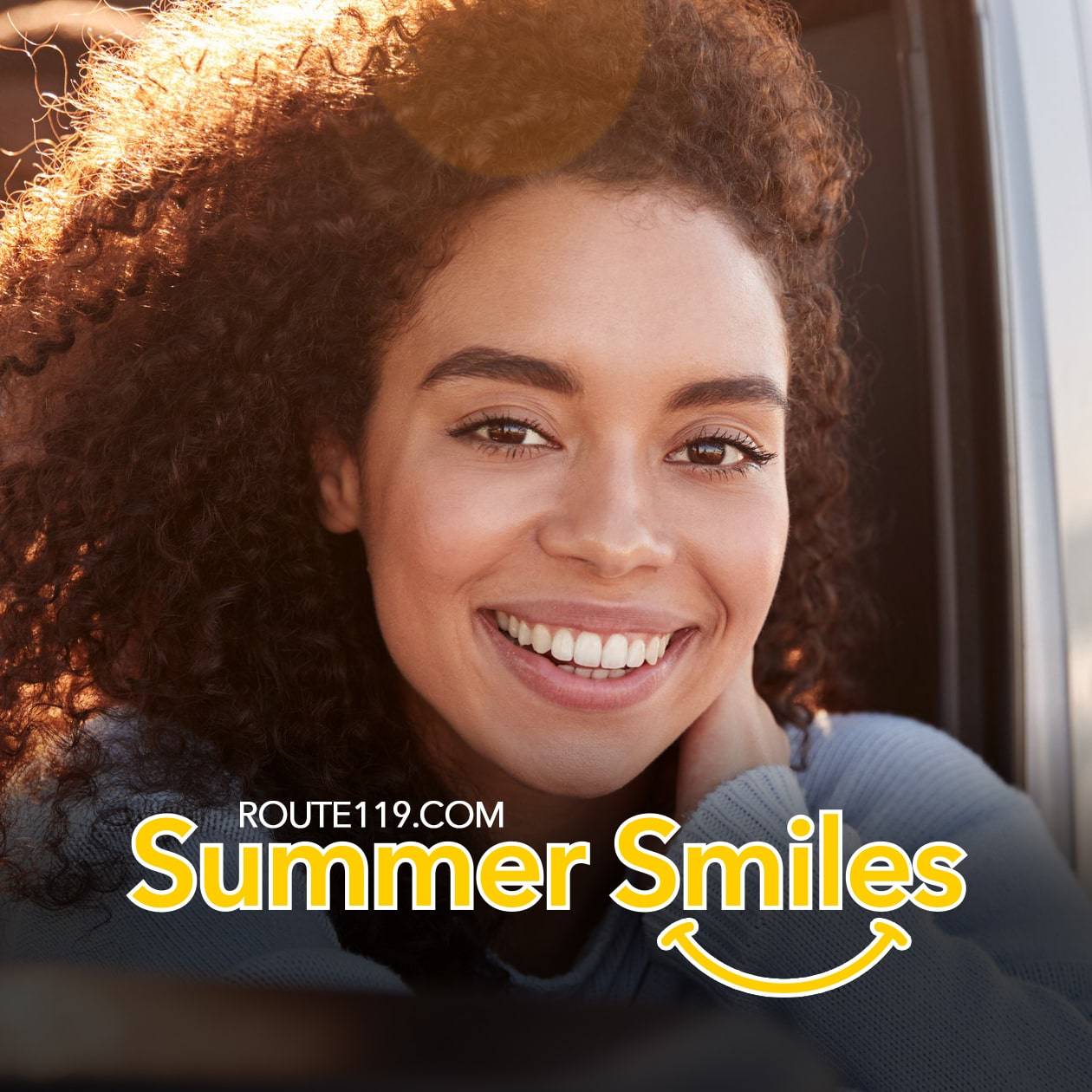 People in car smiling. Route 119 Summer Smiles.