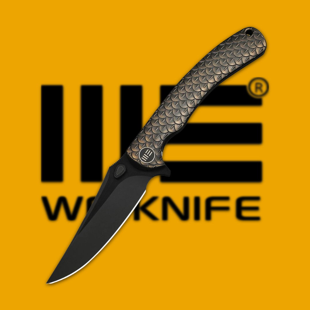 Black knife with a textured handle on an orange background.