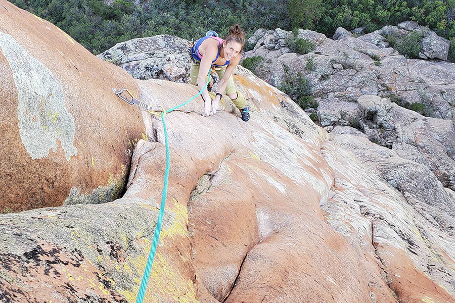 Amity Smiling while climbing