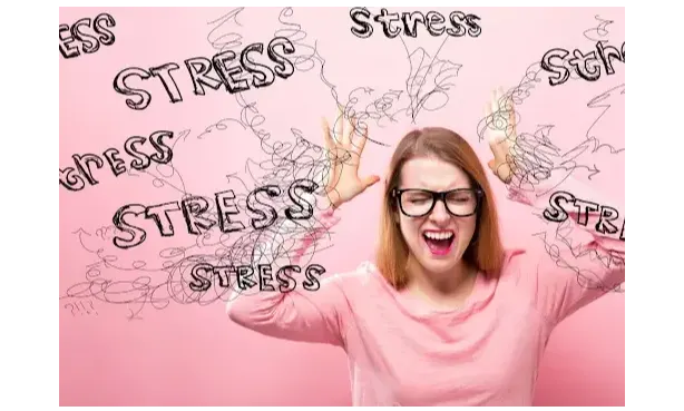Woman with hands above head.. The word stress is written several times around her. 