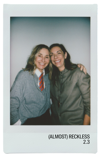 Amy and Liz smiling together on a polaroid. Image redirects to Almost Reckless podcast episode 2.3