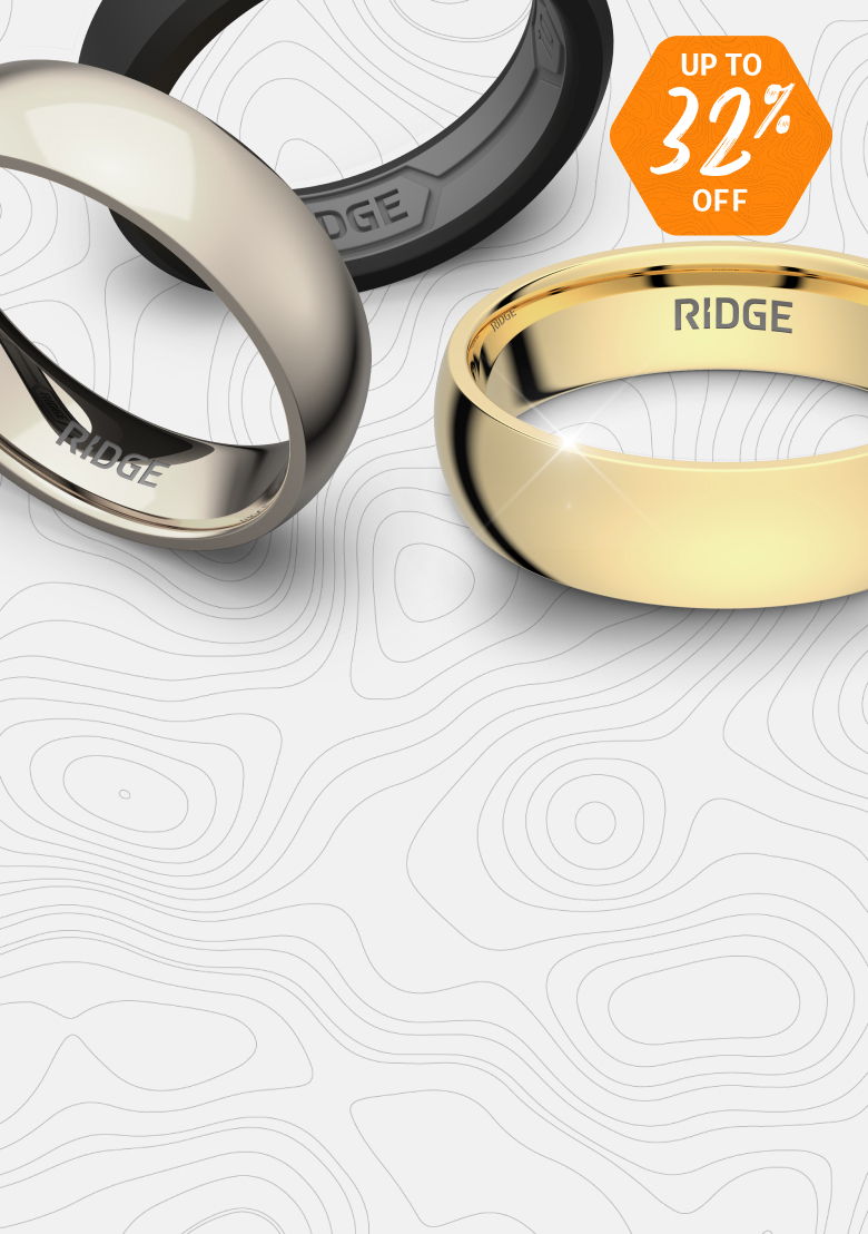 Three rings displayed on a textured background with a discount label.