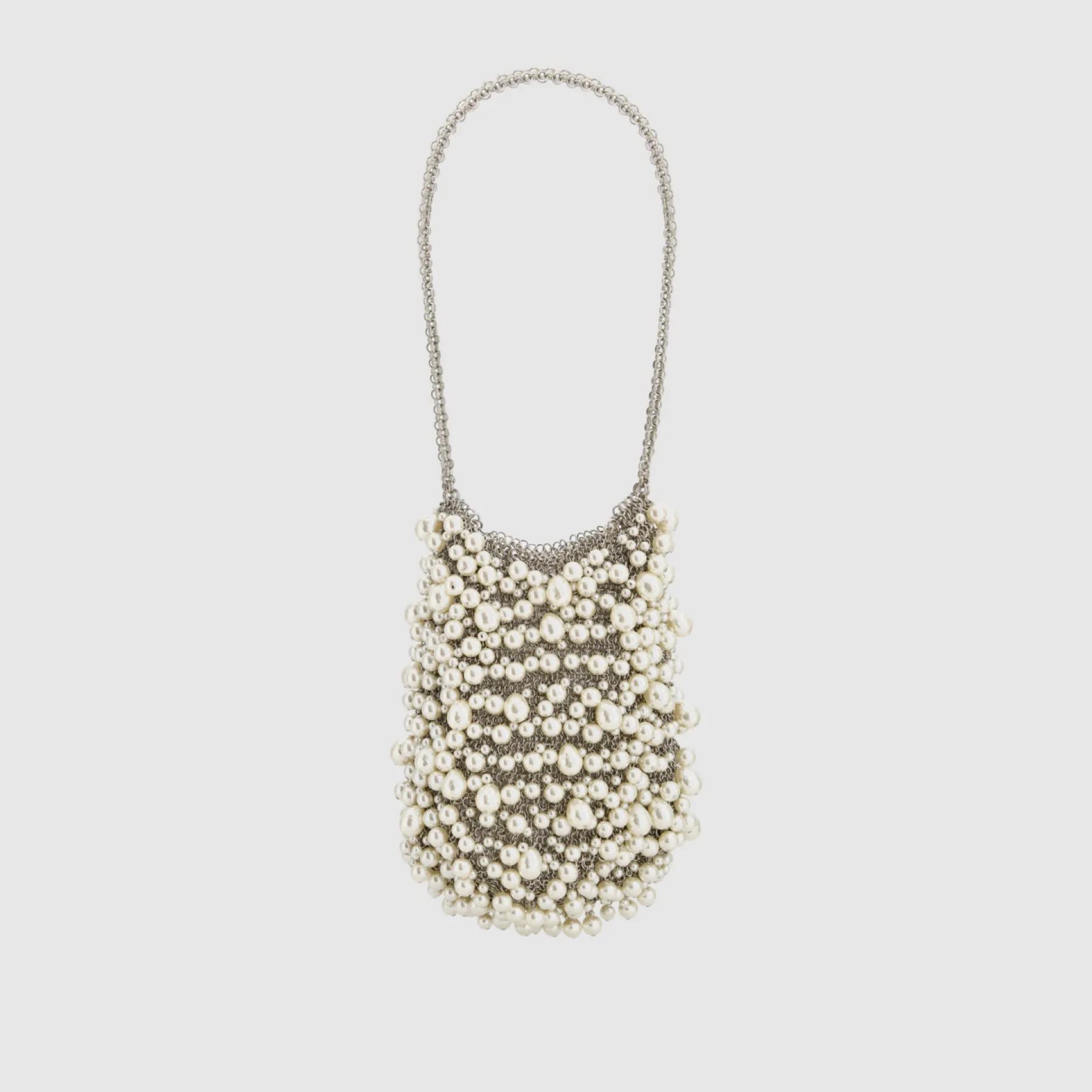 A decorative bag made of pearls with a chain strap.