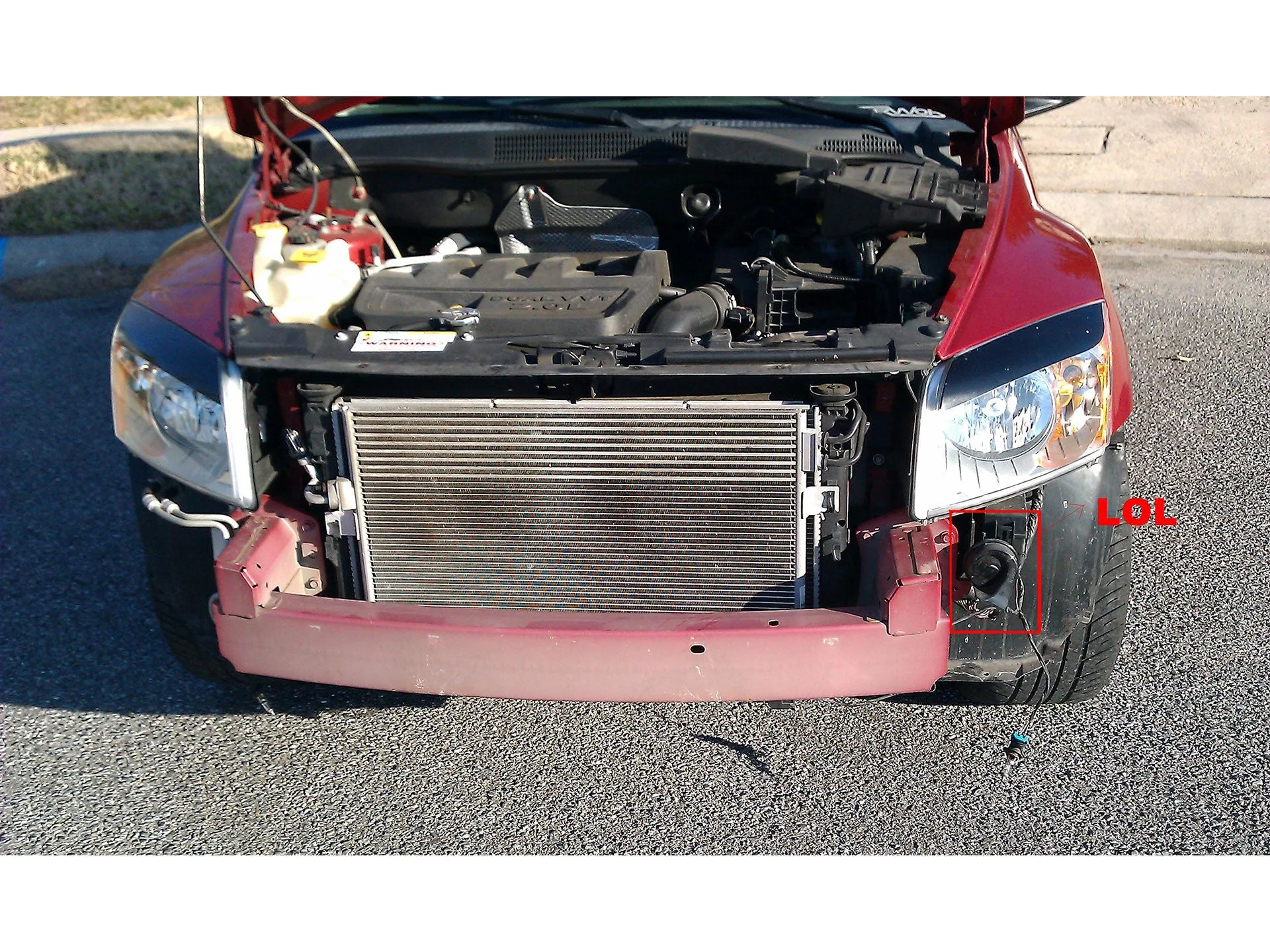 Under-hood or chassis area showing pneumatic connections on Dodge Caliber photo 6