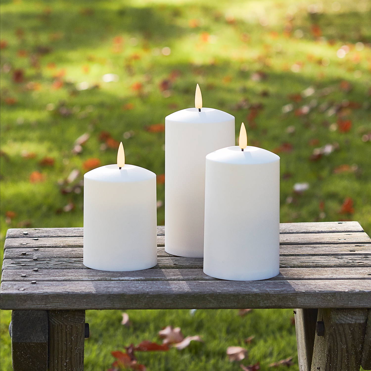 LED candles trio on a bench