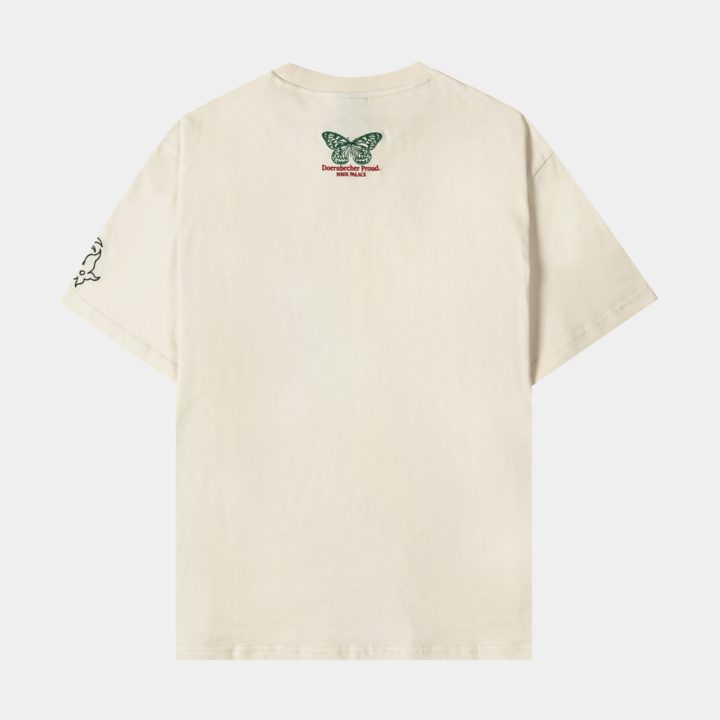 Beige t-shirt with colorful graphic designs on the front and sleeves.