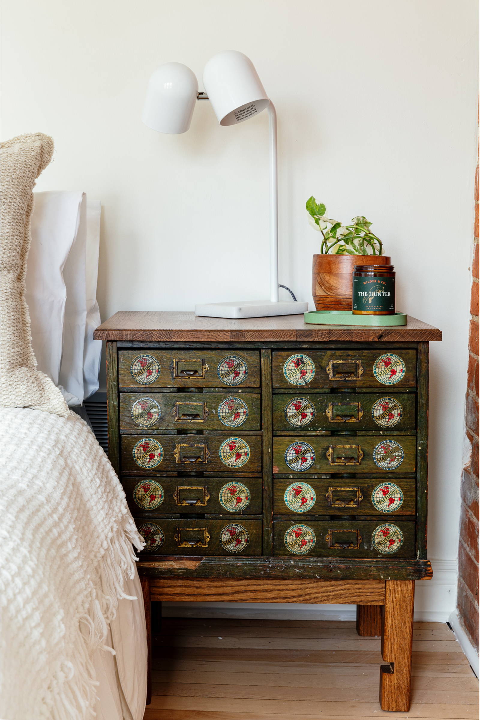 Bedrooms interior design featuring an army green Industrial Multi-Drawer Dresser by Woodward Throwbacks.