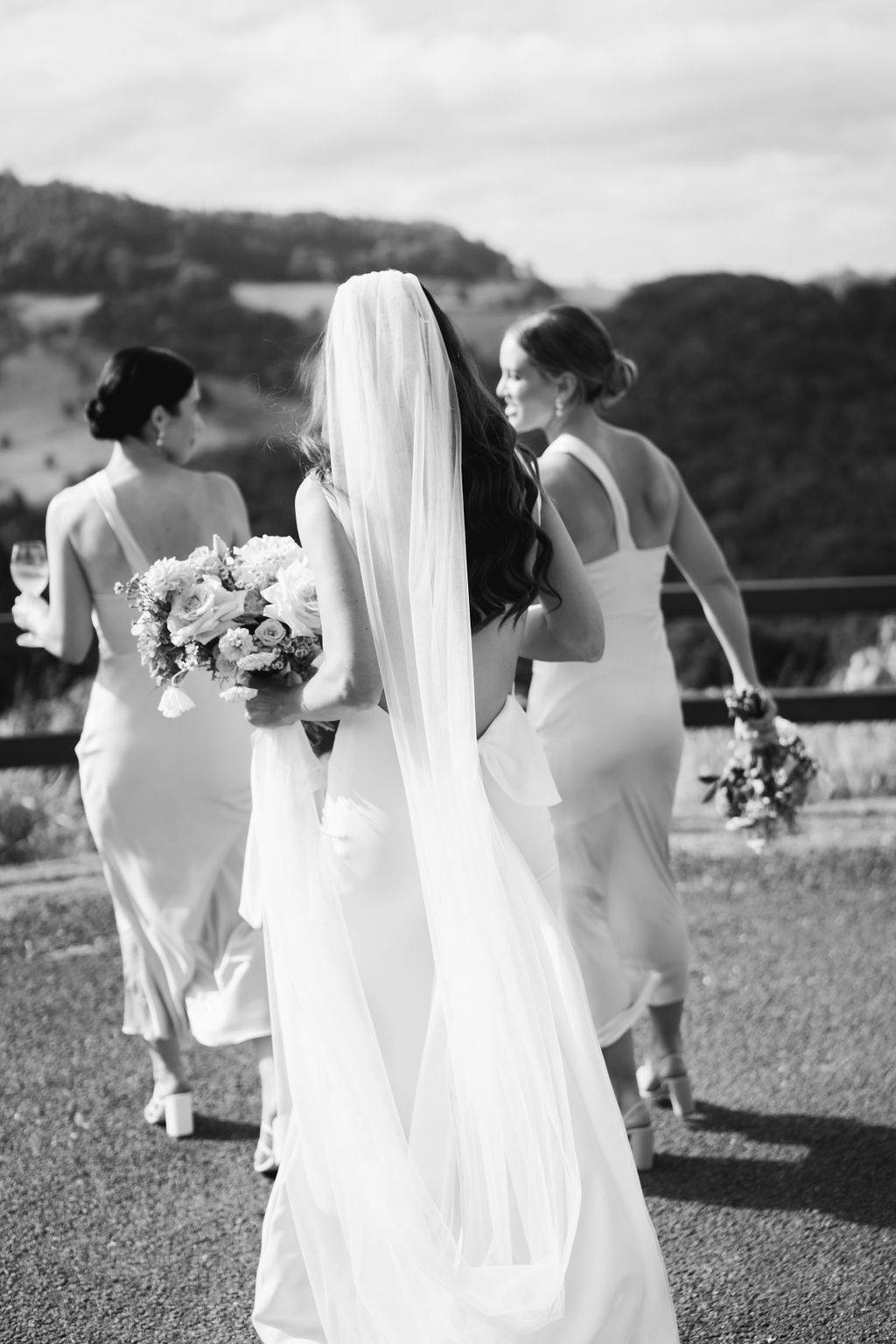 Bride and her bridesmaids from back