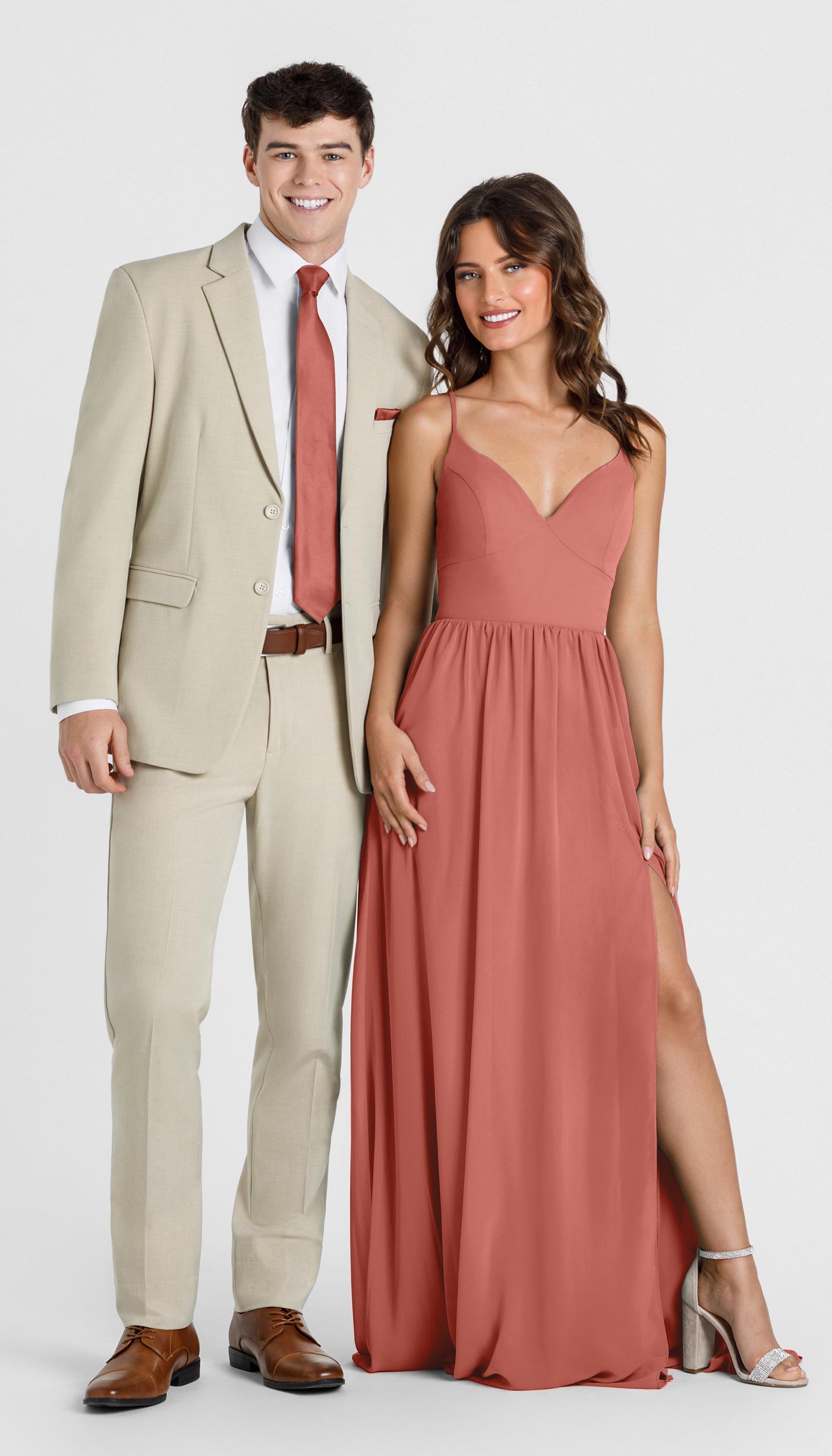 tan suit with terracotta bridesmaid dress