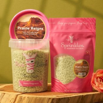 Two containers of green bath salts, one in a jar and one in a bag.