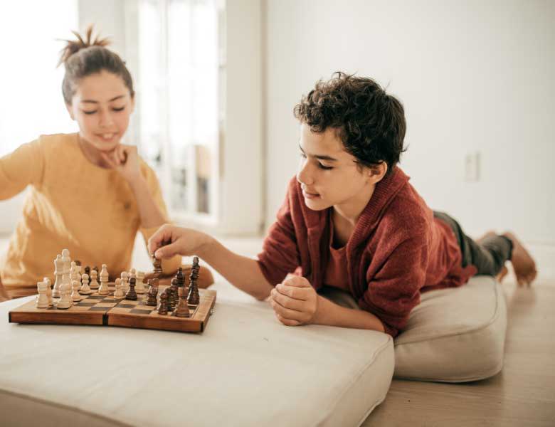 Image of Teens Playing Chess