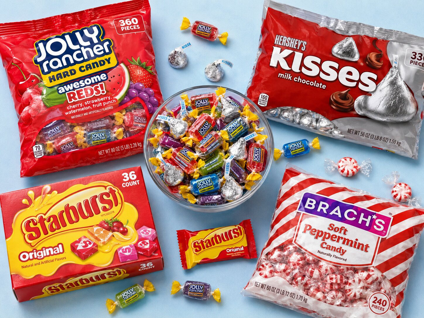 The Trade Show Booth Magnet bulk candy bundle: Jolly Rancher Hard Candy, Hershey's Kisses Milk Chocolate, Starburst Original display box, and Brach's Soft Peppermint &mdash; all individually wrapped, heat-tolerant, booth-ready