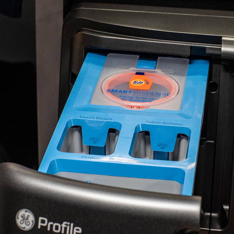 Adaptive SmartDispense™ Technology - drawer pulled out to show where liquid detergent goes.