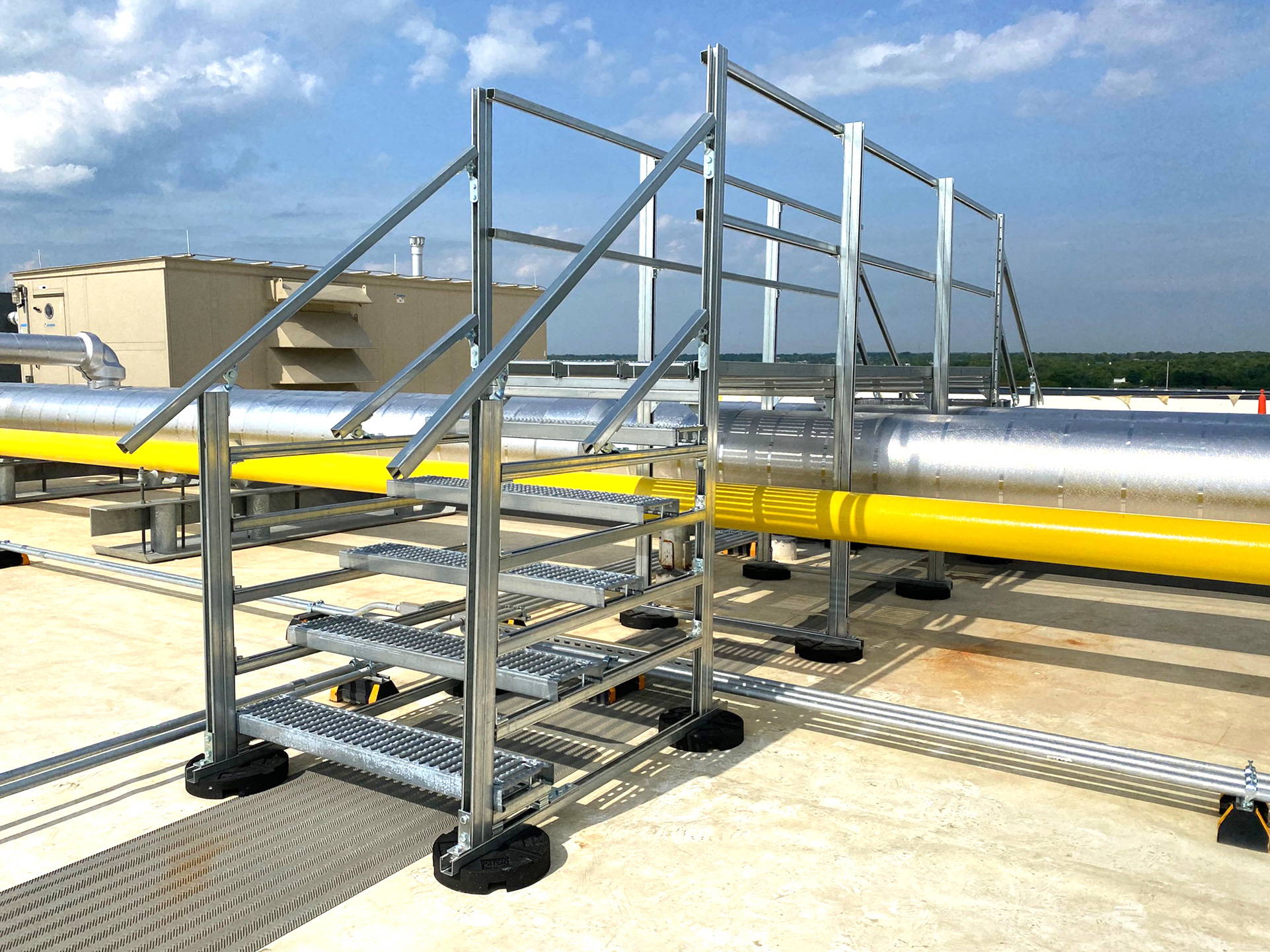 Unipier rooftop supports are ideal for Unistrut crossovers, allowing easy access over pipes and conduit.