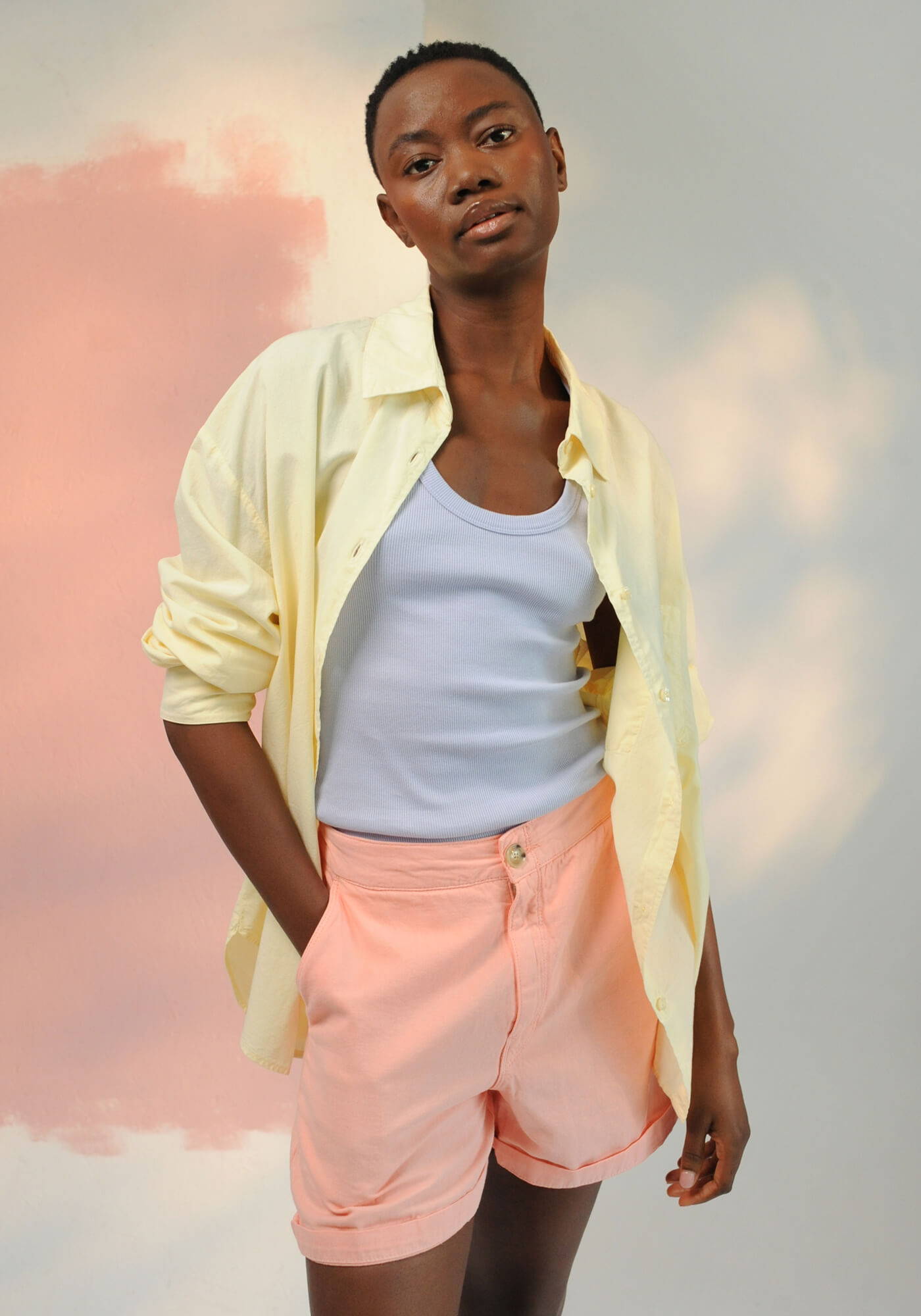A model wearing a look from the SS24 Holiday Pastels womenswear campaign.