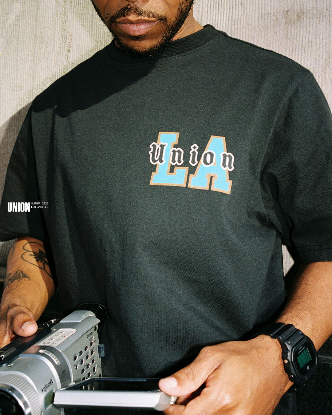 Person wearing a black shirt with 