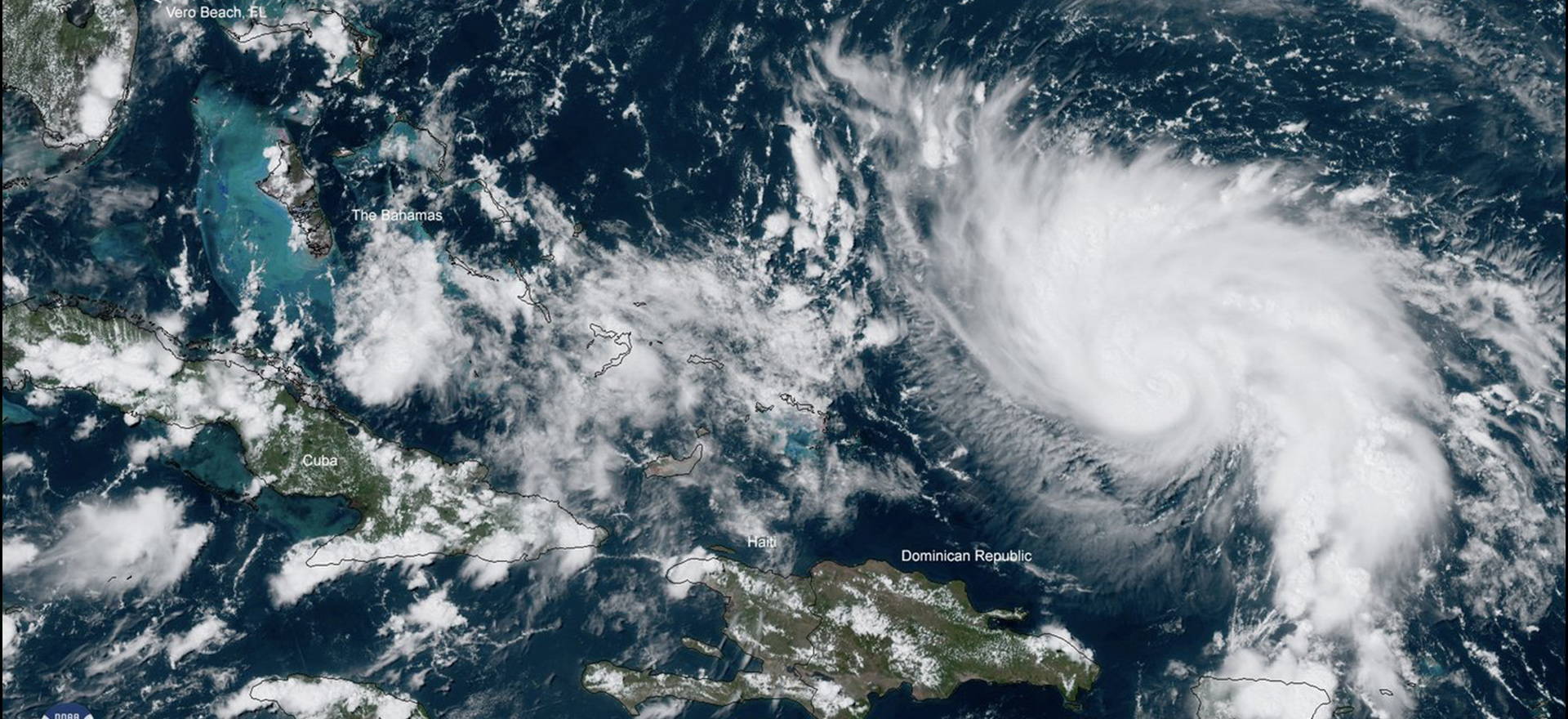 A satellite image of a hurricane over the Caribbean Islands. 