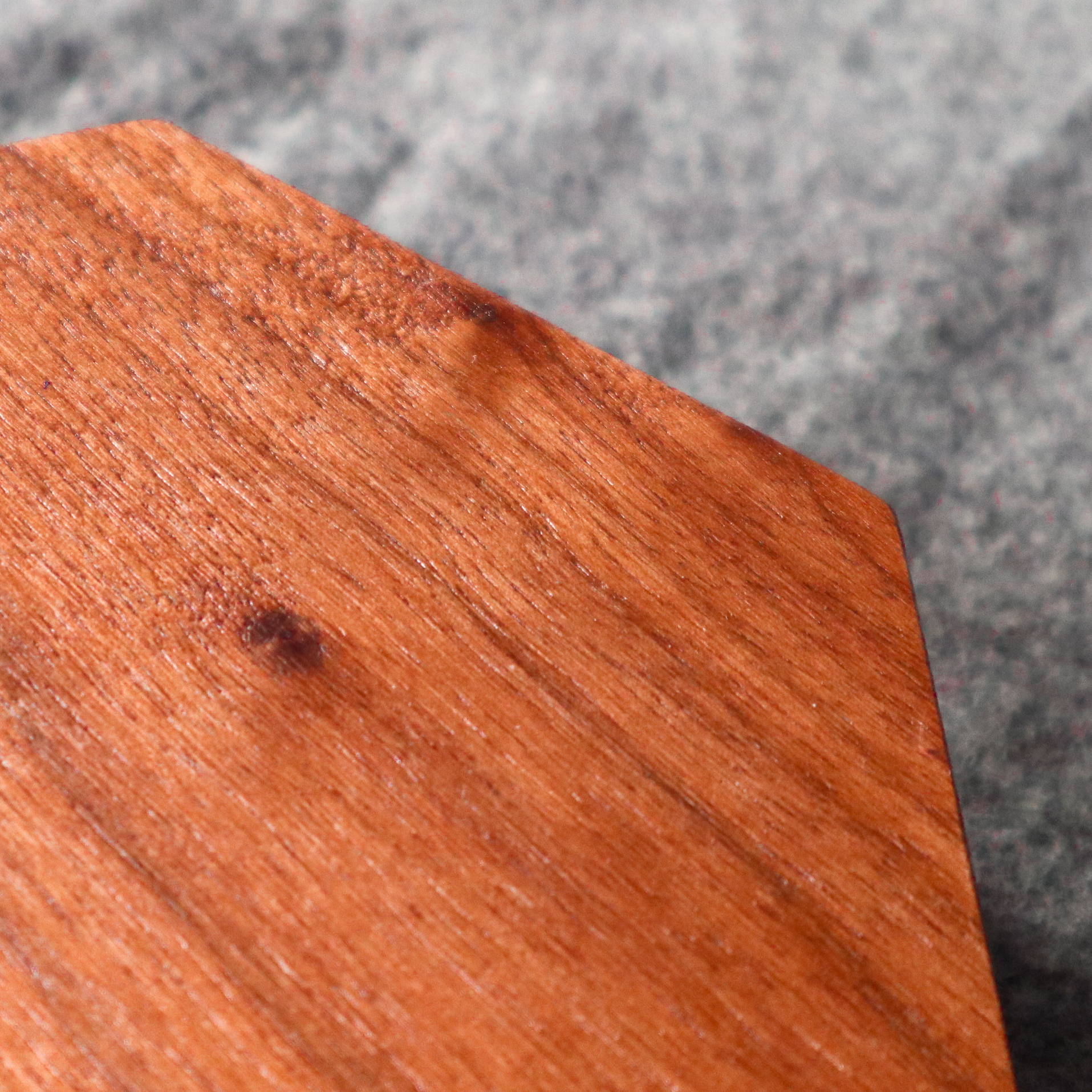 Real walnut base close up photo of the edge