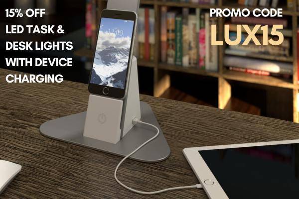 Brooklyn LED Desk Light charging a smartphone and a tablet