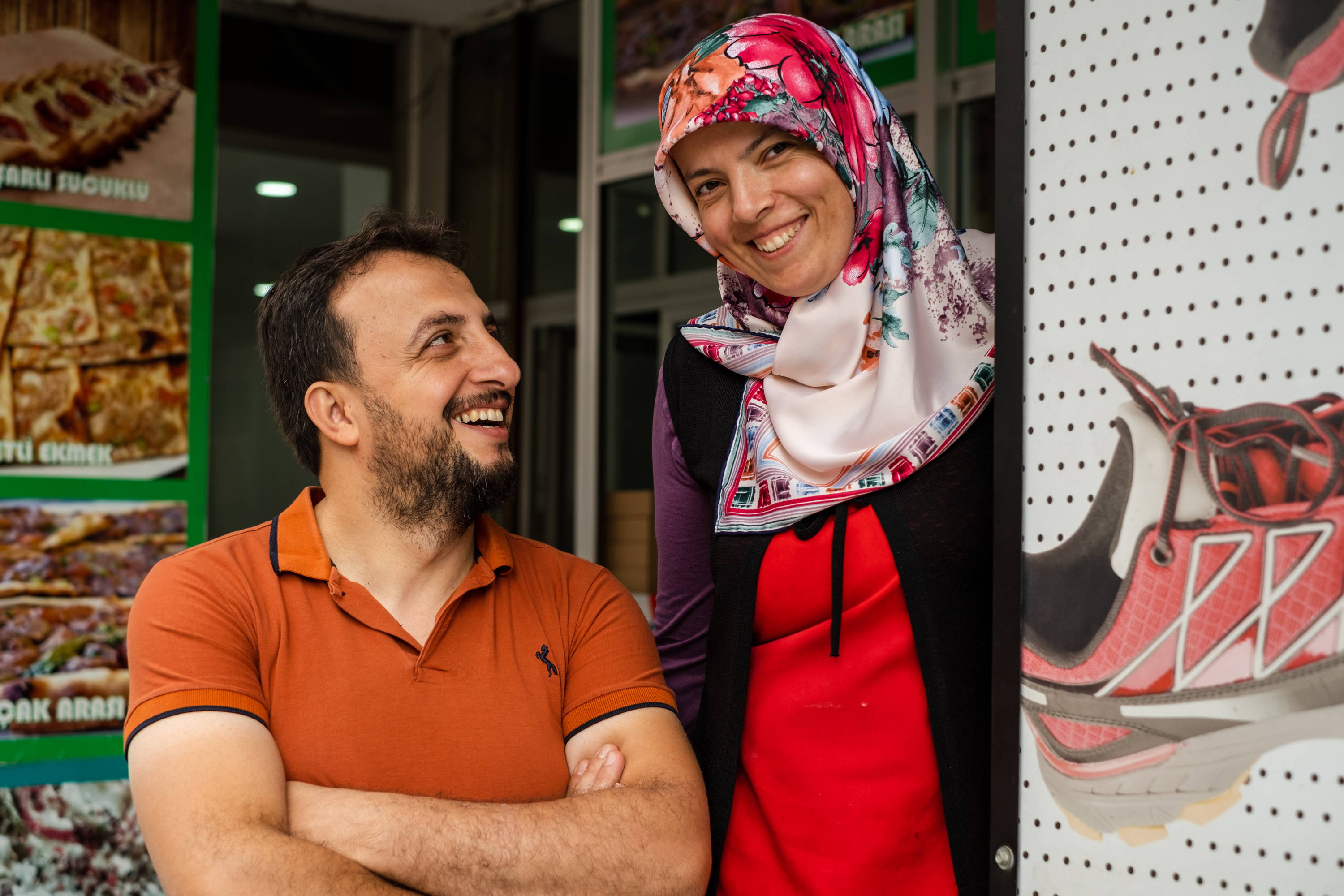 Adem and his wife smiling