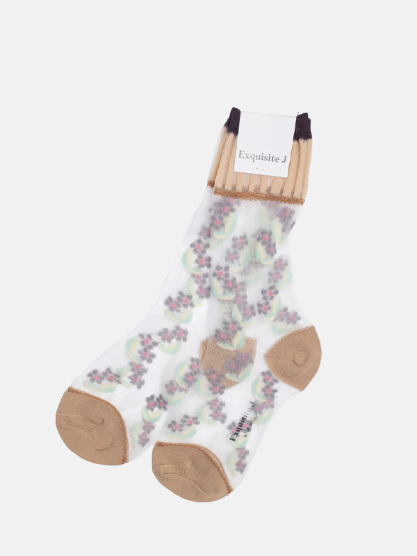 Patterned socks with floral design and beige accents on a white background.
