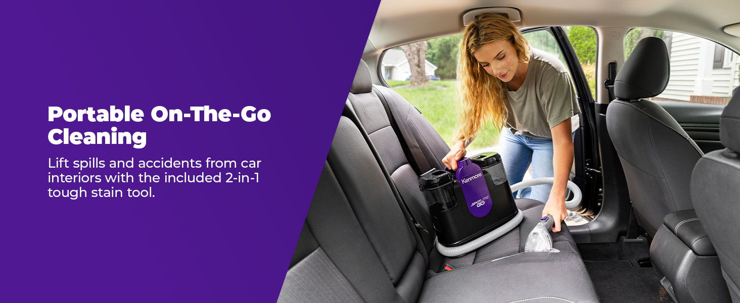 Woman cleaning car interior with portable spot cleaner.