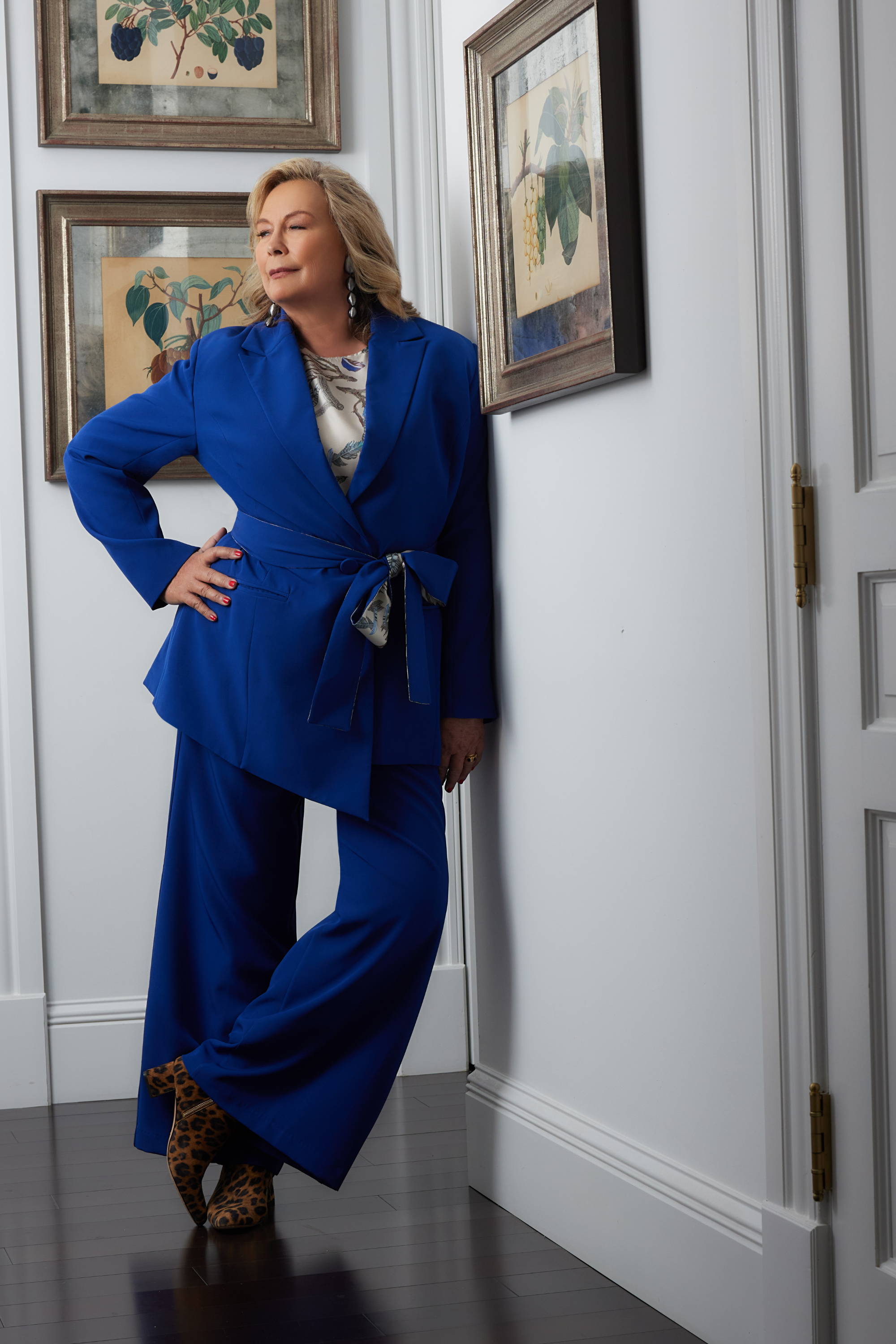 Ala Isham wearing blue silk lined matching suit with fether printed shell tank in New york City by Ala von Auersperg