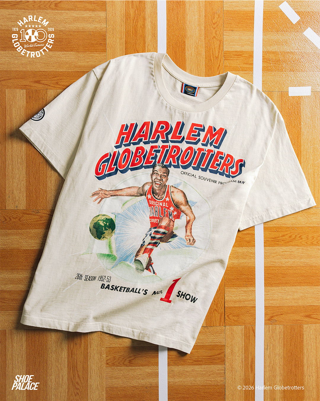 T-shirt featuring Harlem Globetrotters graphic on a wooden floor background.