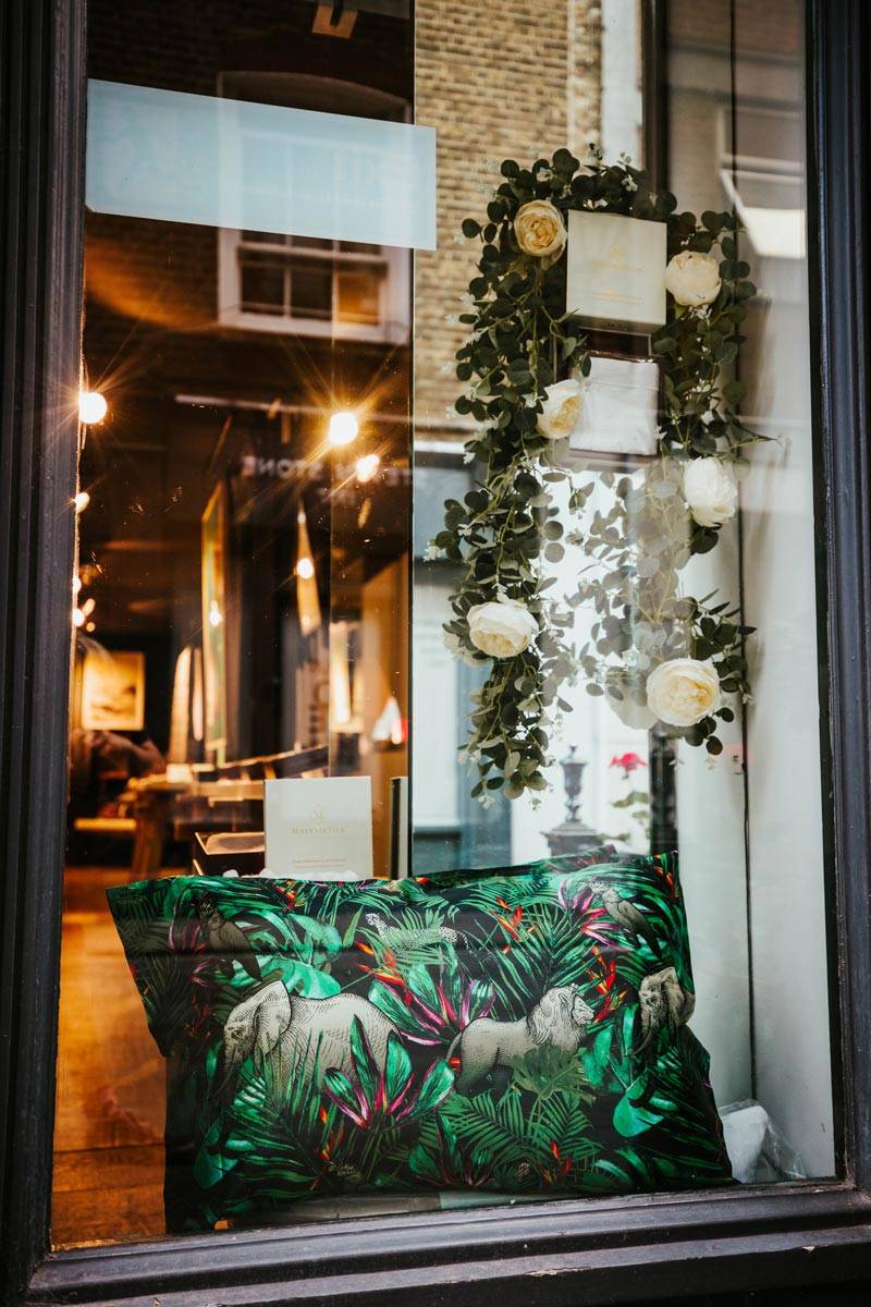 pure silk jungle pillowcase window display