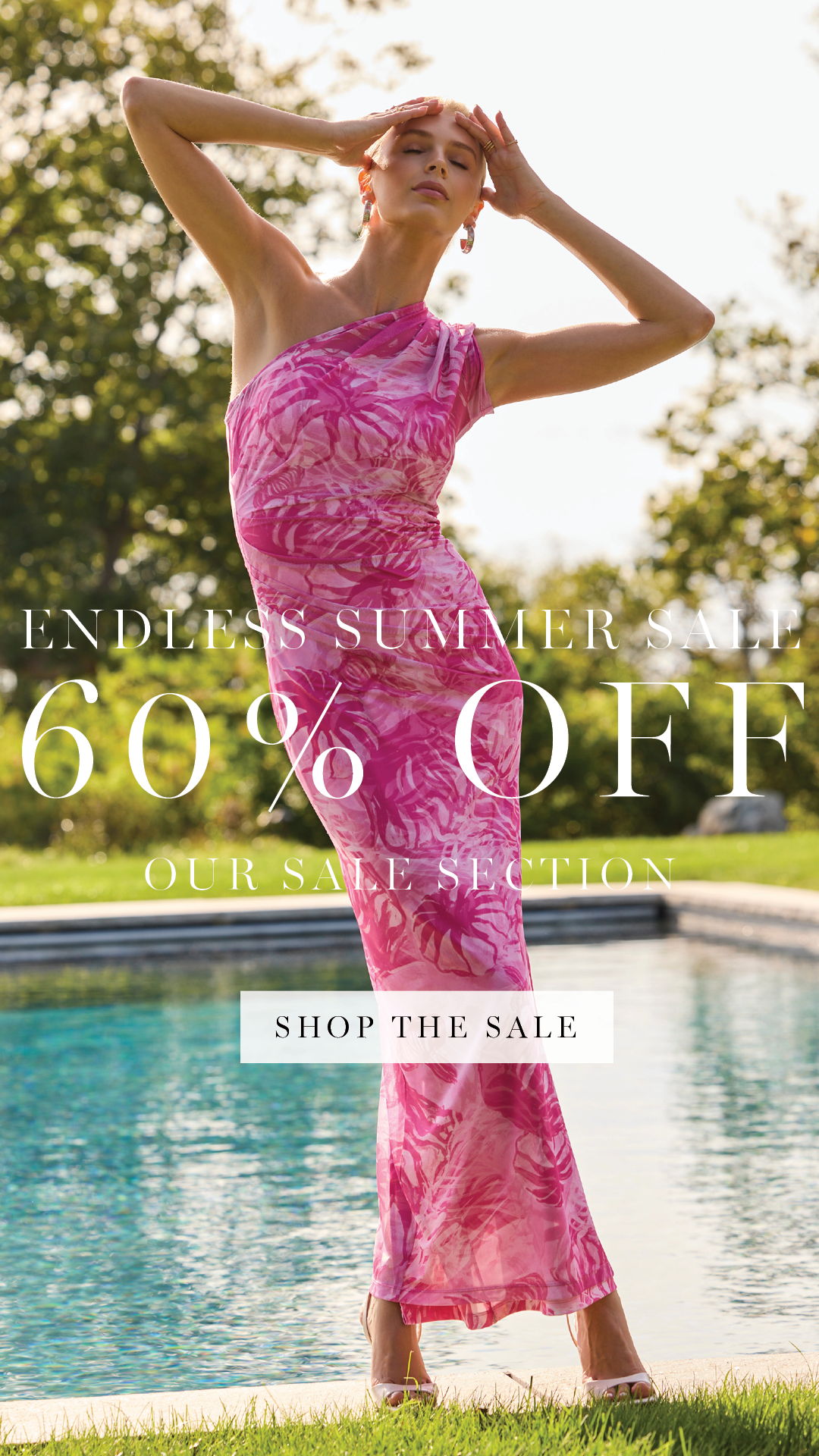 Model in a pink dress by a pool promoting a summer sale.