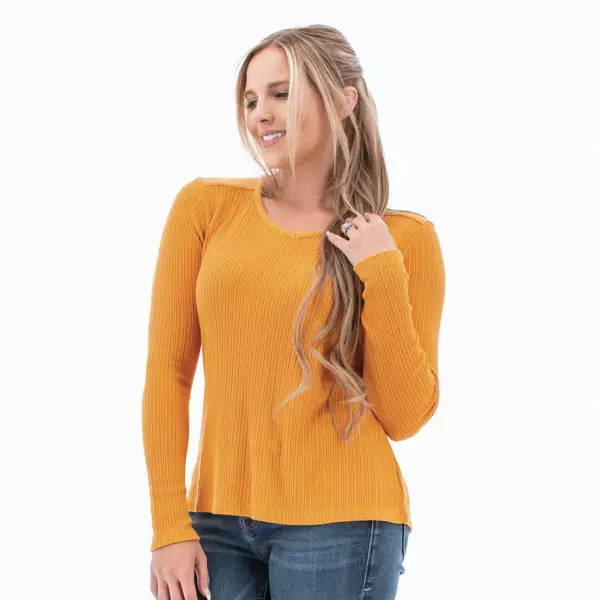 Detail view of Bliss top in gold-orange color.