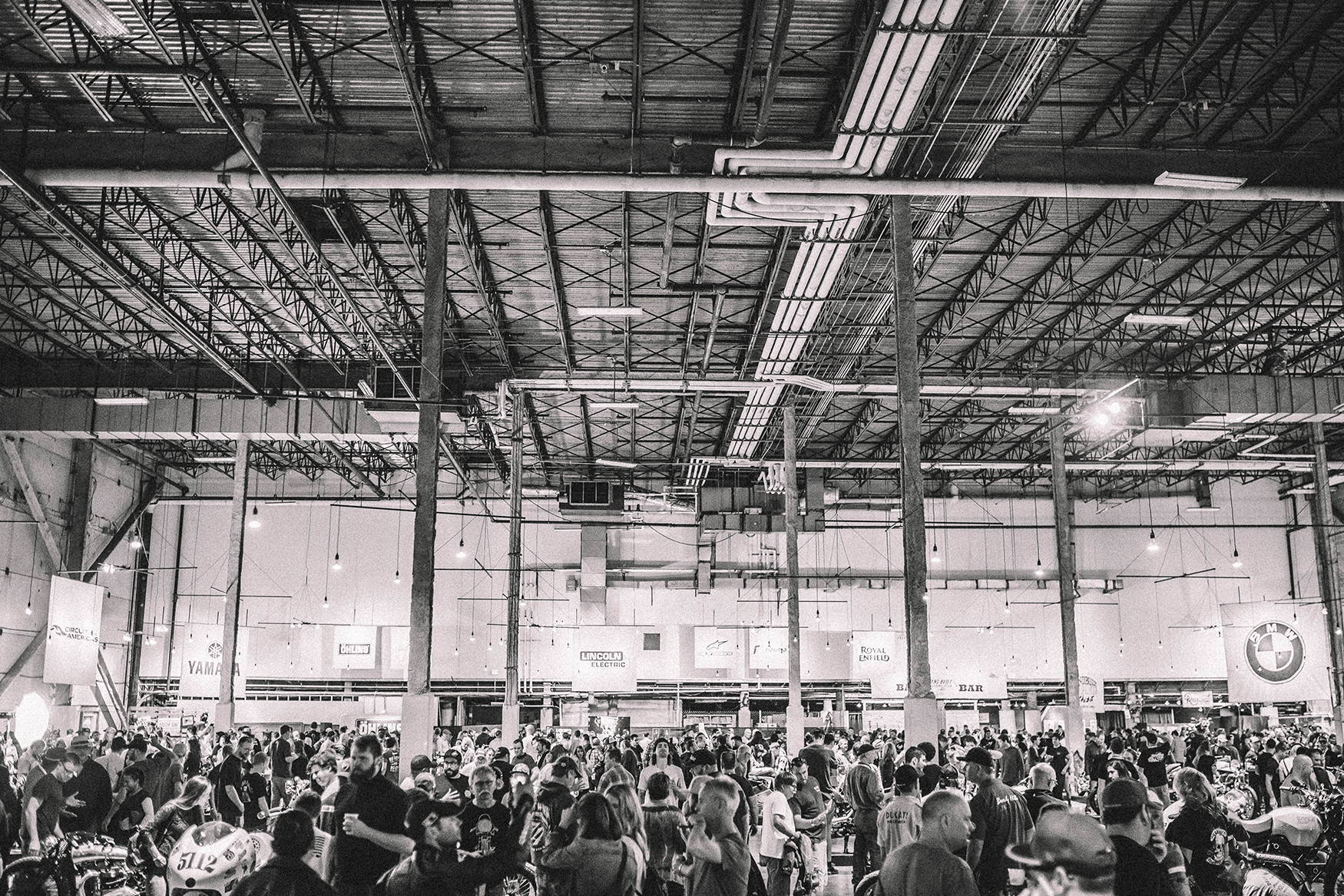 A photo in black and white of the crowd at the Handbuilt Motorcycle Show