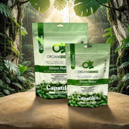 Two packages of green capsules on a wooden surface in a lush jungle setting.