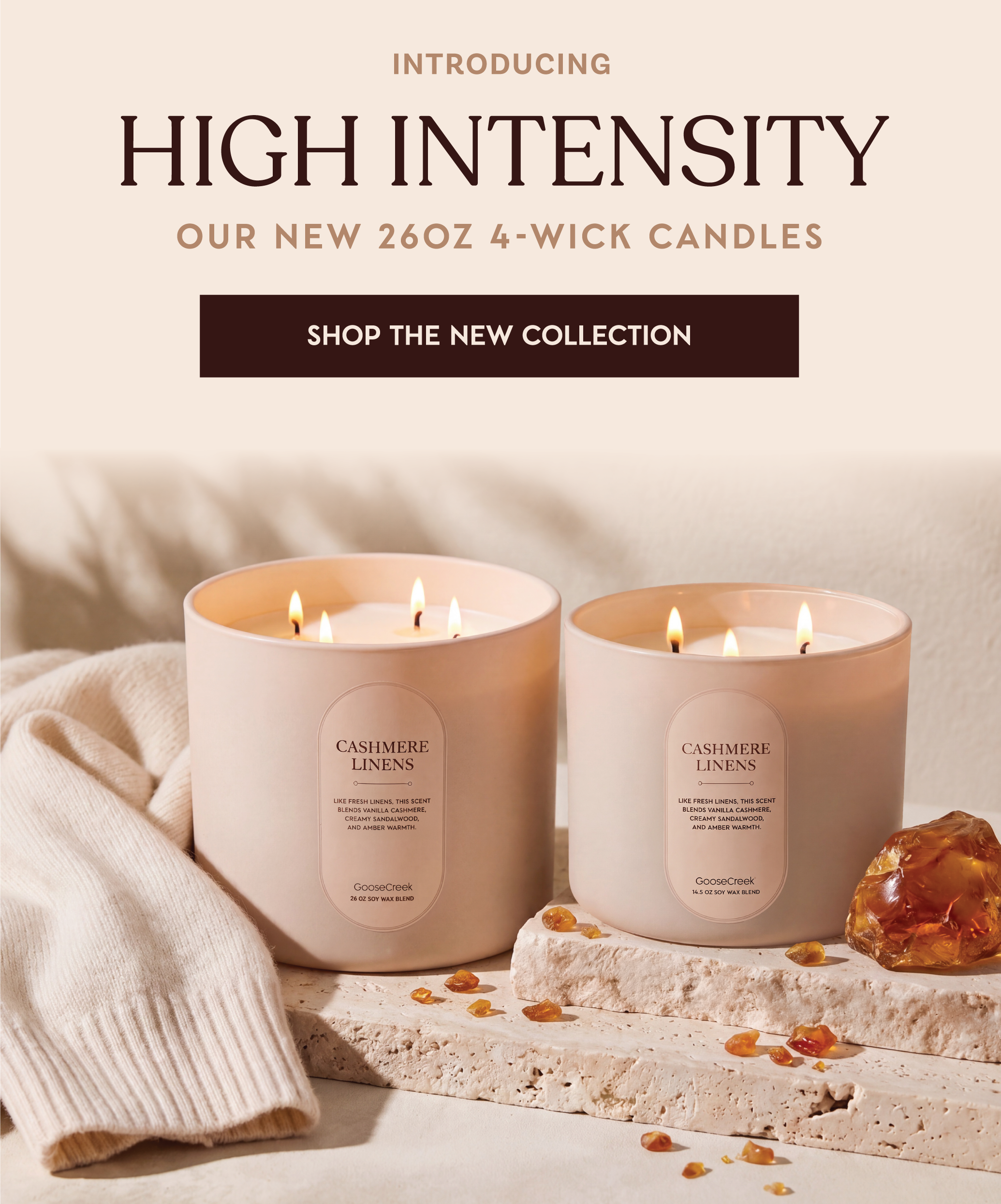 Two 4-wick candles with flames, displayed with a cozy background.