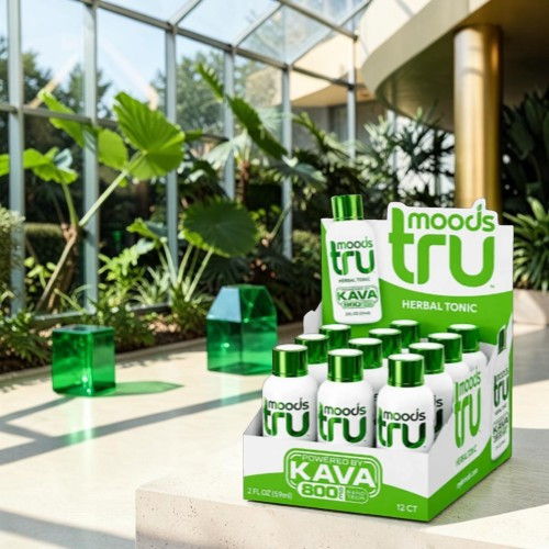 Display of Kava drinks in a greenhouse setting with green plants.