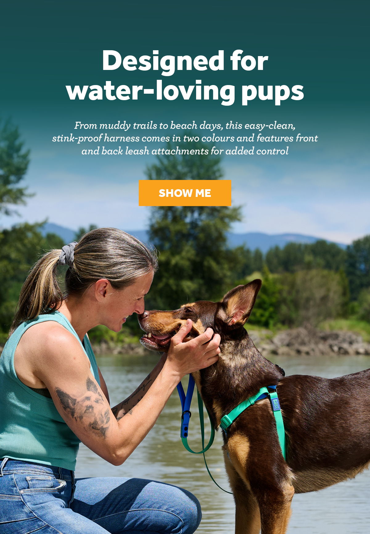 Woman interacting with a dog by the water, promoting a harness for pets.