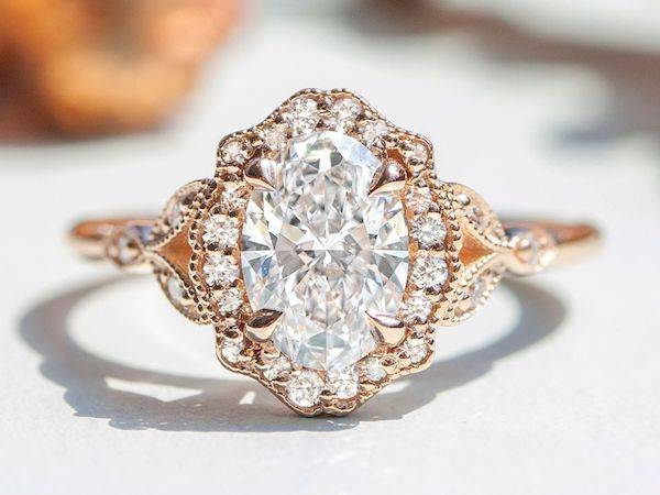 romantic oval halo engagement ring