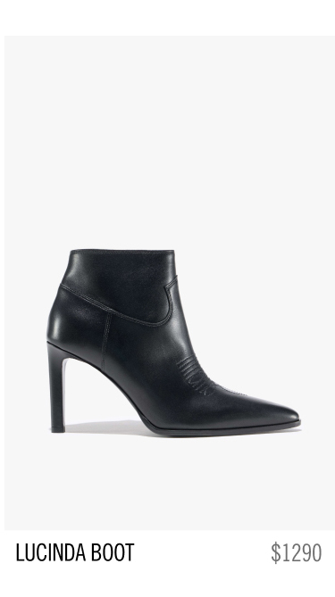 Black high-heeled boot with pointed toe, labeled as 