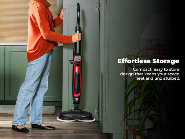 Person placing a steam cleaner in a kitchen cabinet, text about effortless storage