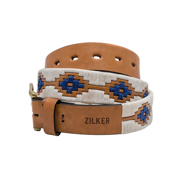 Leather belt with colorful geometric pattern and Zilker branding.