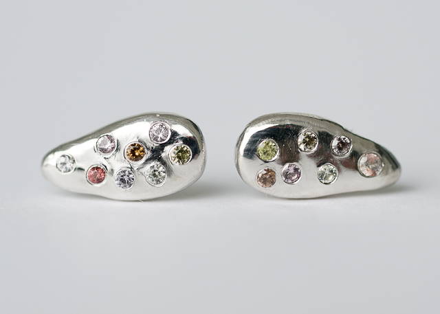 starburst tear drop silver earrings with sapphires