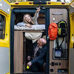 Portrait of Stefany and James in their RV.