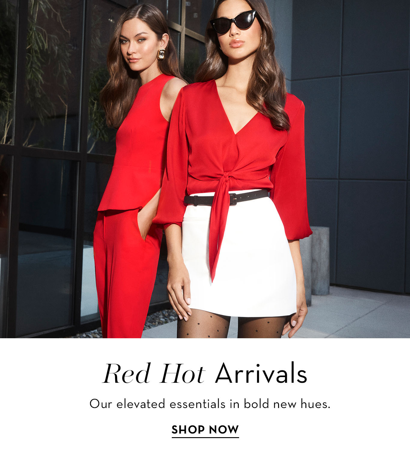 Two women in stylish red outfits promoting new arrivals.