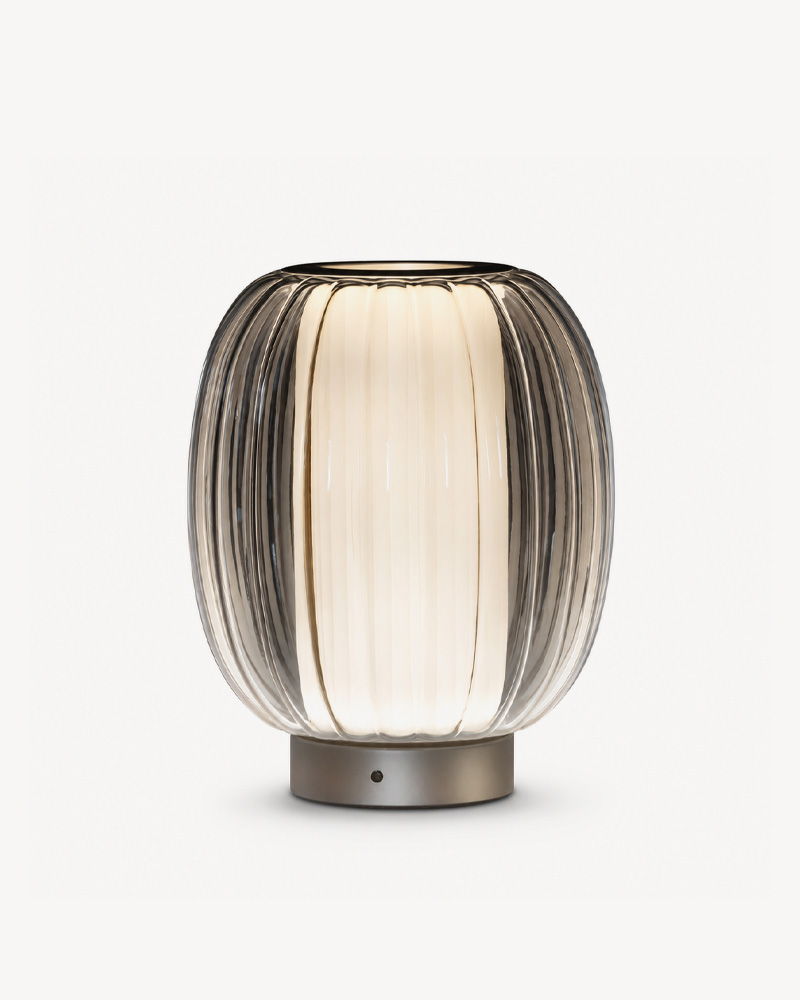 A decorative Contardi lamp with a rounded design and soft illumination.