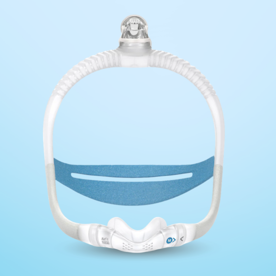 A white swim mask on a light blue background.