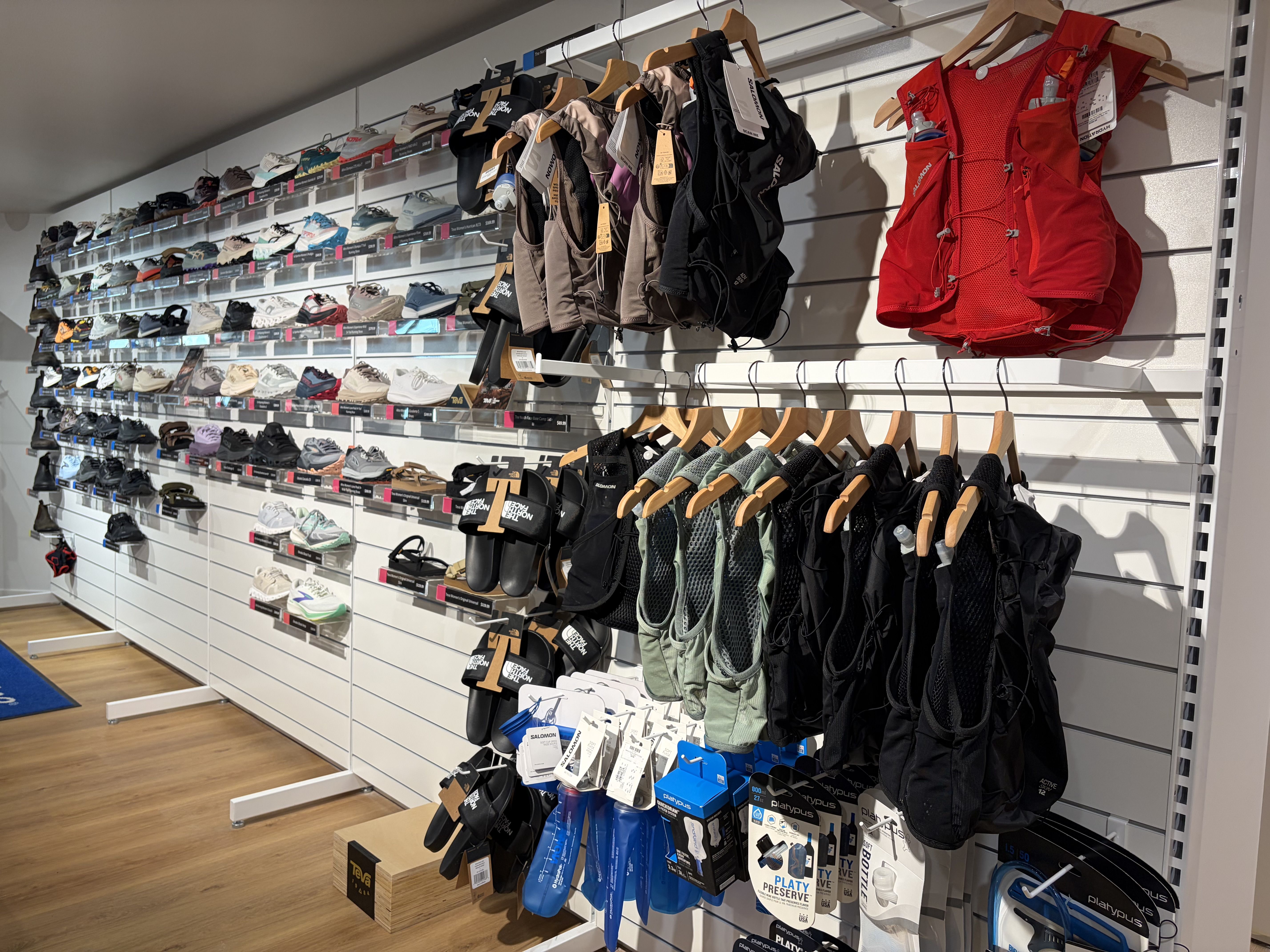 Trail shoes and running vests at Outside Sports Noosa